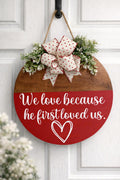 Christian Round Wood Door Hanger – Farmhouse Scripture Decor – 1 John 4:19 Sign